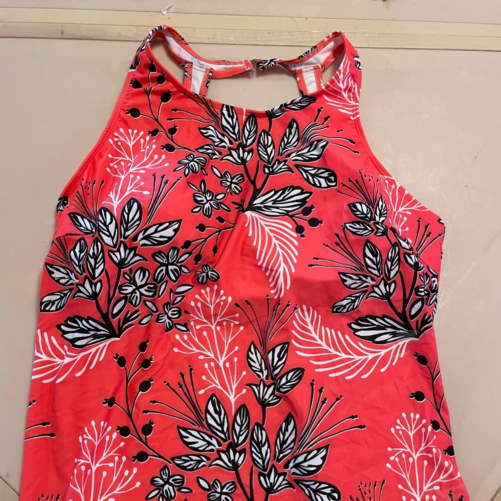 Bathing suit top, red family with flowers, never worn.
